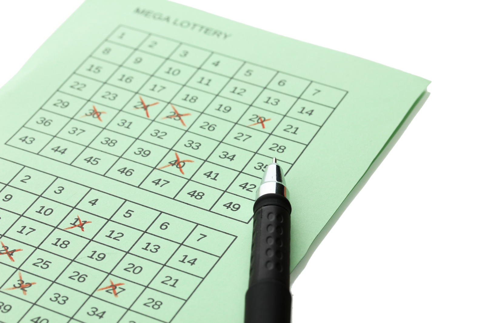 Maintenance schedule checklist with marked dates and a pen, representing planned inspections and winter upkeep